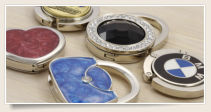 ganci appendiborsa da tavolo